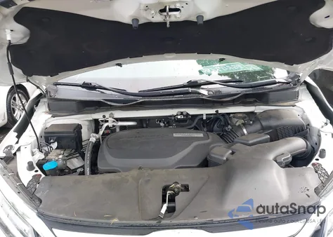 2018 Honda Odyssey Elite z USA, uszkodzony, nr VIN 5FNRL6H94JB008108